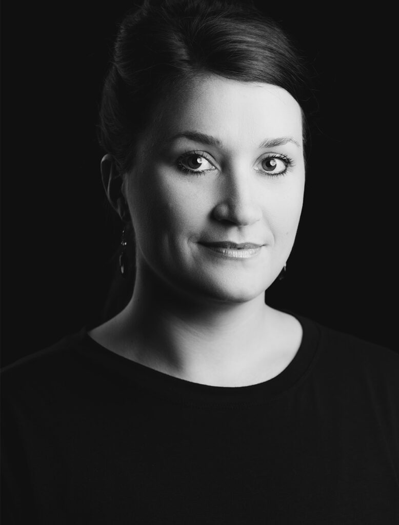 Portrait of Stephanie Orza in black and white.